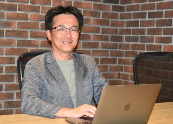 写真：株式会社 クローバー・サン 執行役員 ソリューション事業部　事業部長　兼　ITインフラソリューション部　部長  赤堀 博昭氏